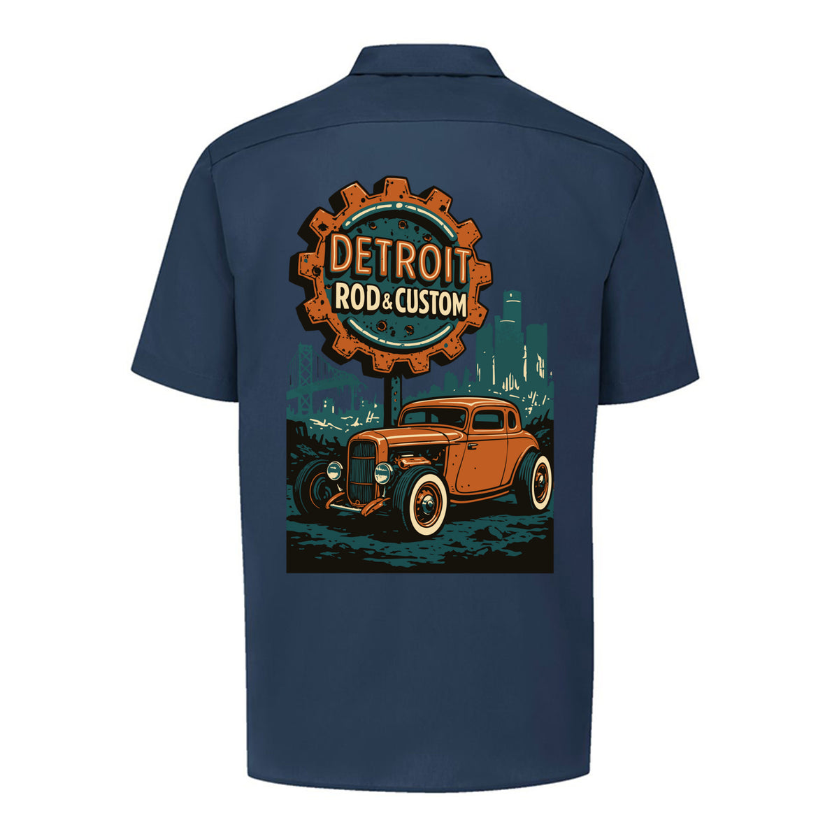 Back of a dark navy Dickies short-sleeve work shirt with an orange Atomic Coupe hot rod under a DETROIT ROD & CUSTOM gear badge.
