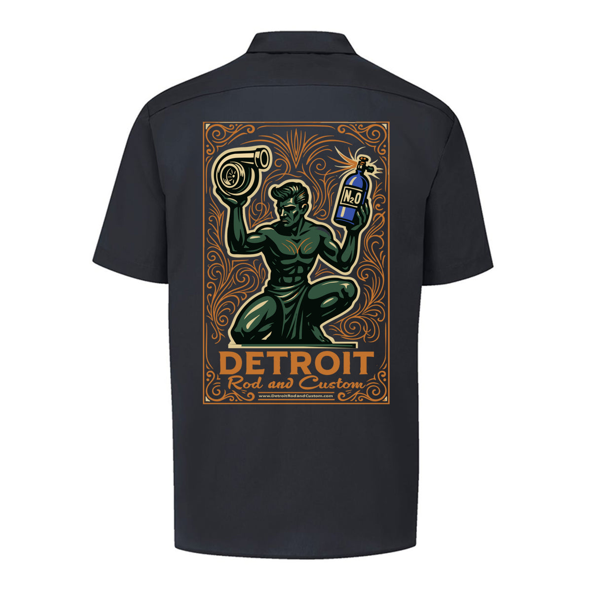 Back of a black Dickies work shirt with a large print of the green kneeling statue holding a turbo and a bottle, over an orange DETROIT Rod and Custom panel.