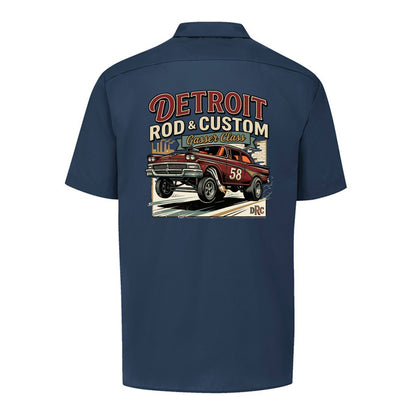 Back of a dark navy Dickies short-sleeve work shirt with a burgundy #58 Galaxie gasser launching nose-up under a red DETROIT ROD & CUSTOM banner.