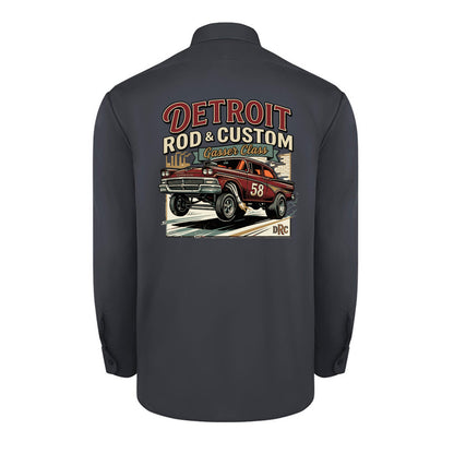 Back of a dark charcoal Dickies long-sleeve work shirt with a burgundy #58 Galaxie gasser launching nose-up under a red DETROIT ROD & CUSTOM banner.