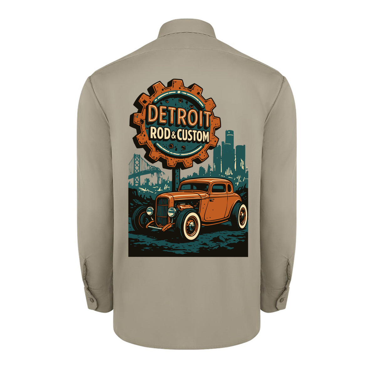 Back of a desert sand Dickies long-sleeve work shirt with an orange Atomic Coupe hot rod under a DETROIT ROD & CUSTOM gear badge.