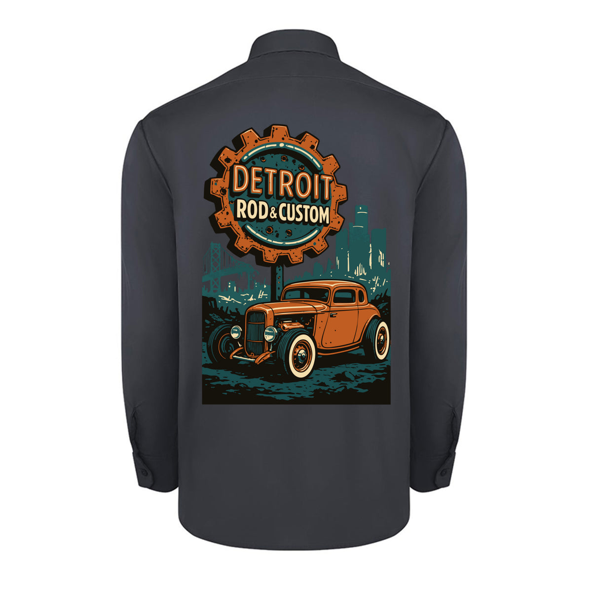 Back of a dark charcoal Dickies long-sleeve work shirt with an orange Atomic Coupe hot rod under a DETROIT ROD & CUSTOM gear badge.